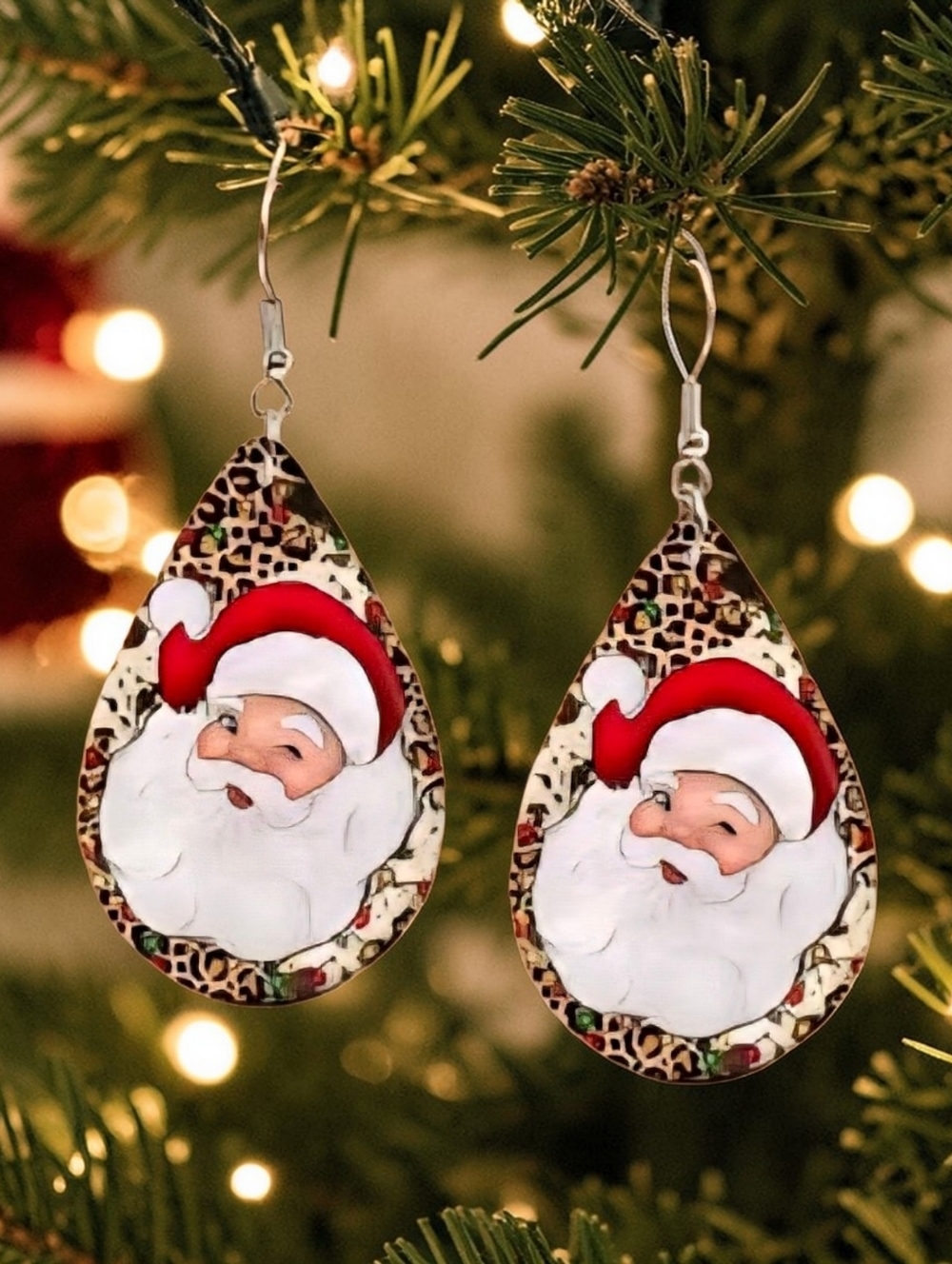 Teardrop-shaped dangle earrings features a vintage Santa Claus.